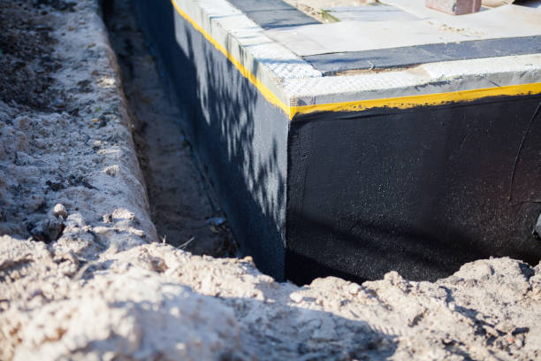 Professional Waterproofing technician working in Findlay, OH